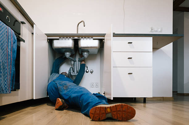 Professional Plumbing technician working in Cedar Rapids, IA